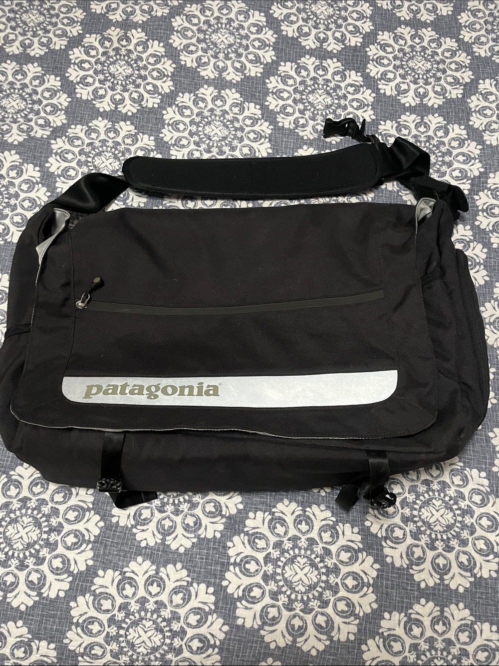 Patagonia Black Messenger Bag with Reflective Logo